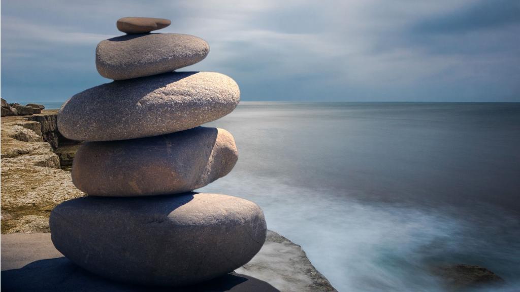 Stacked rocks along the shore