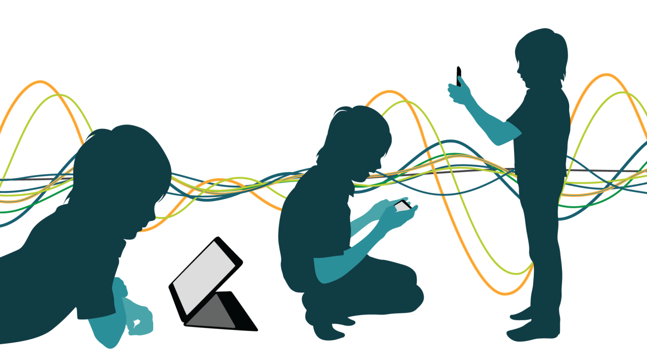 Silhouette of kids playing with technology