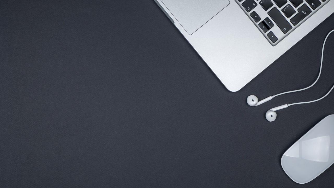 Minimal home office desk. Top view shot. Freelancer workplace concept