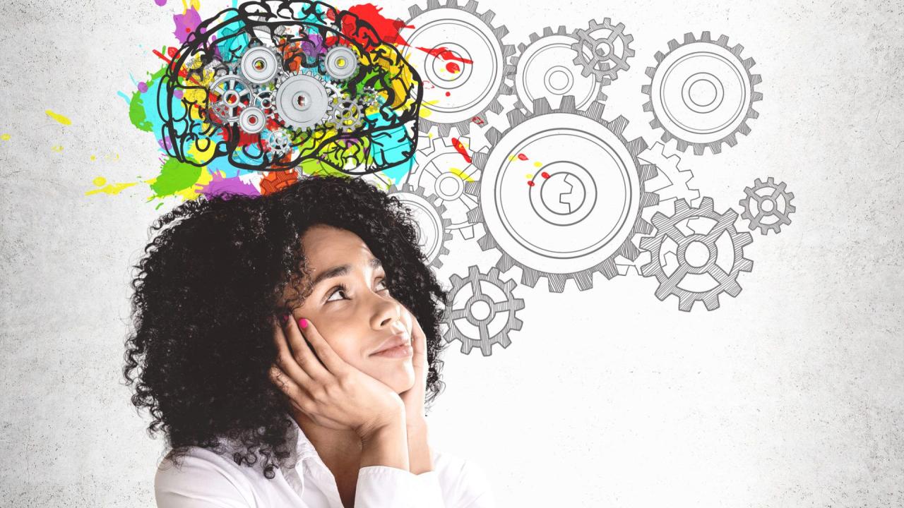Thoughtful young African woman brainstorming