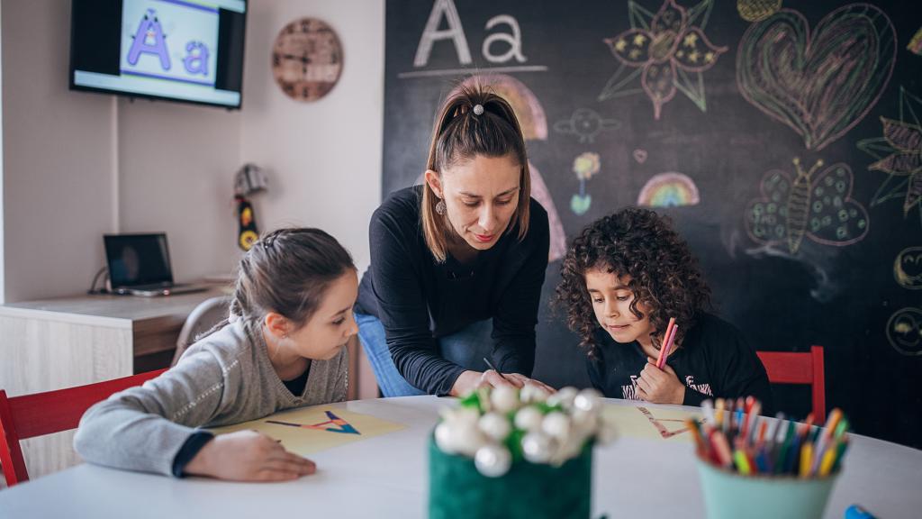 Children learning writing in preschool