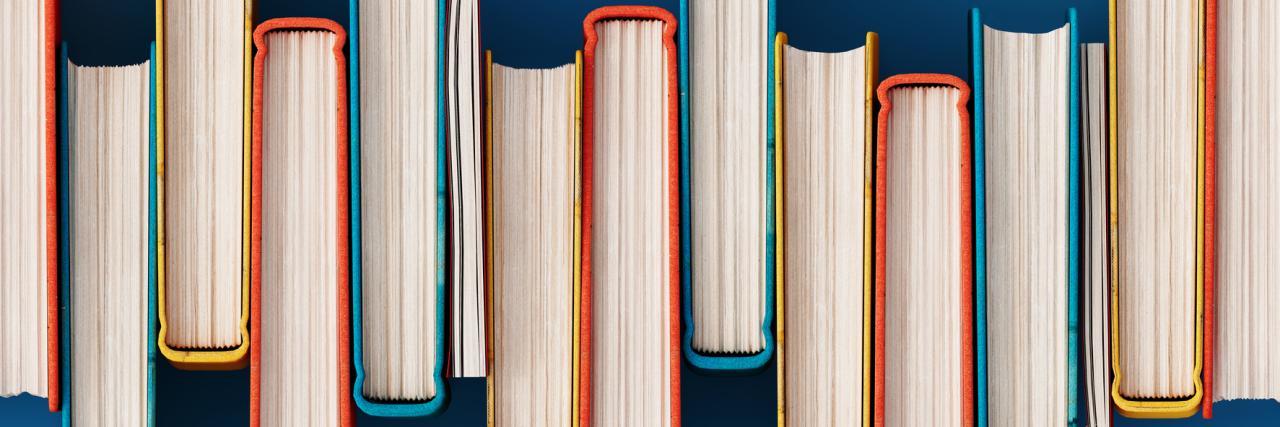 Horizontal off-set stack of multi-color books