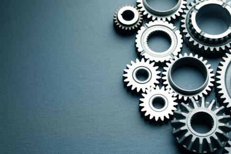 cogs against a dark background