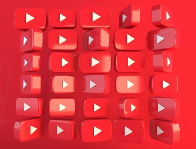 3D models of the YouTube logo tiled across a red background