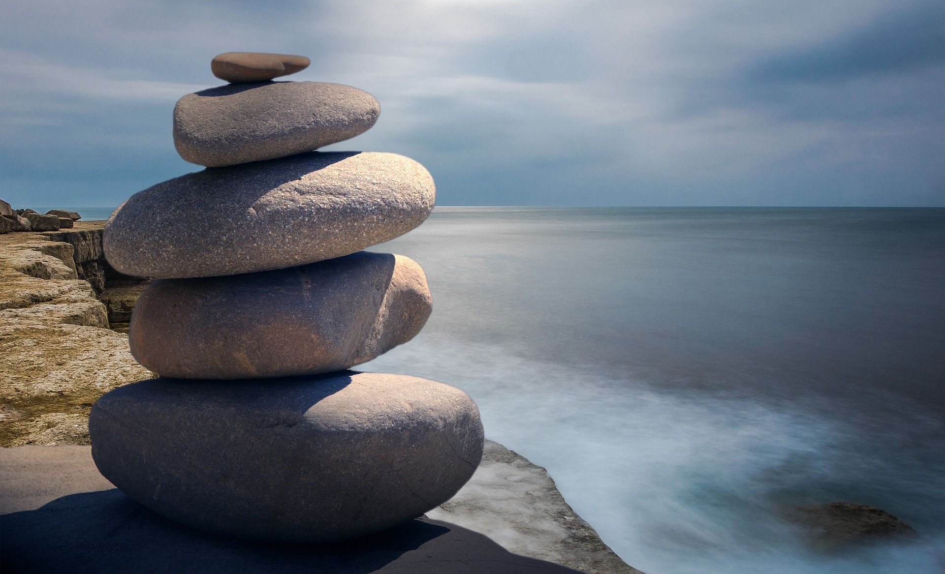 Stacked rocks along the shore