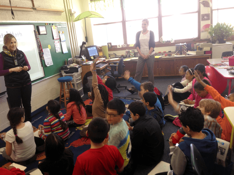 Mrs. Wever speaking to her class