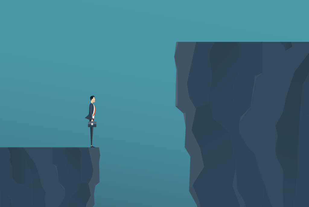 Illustration of a business man standing at the edge of a cliff