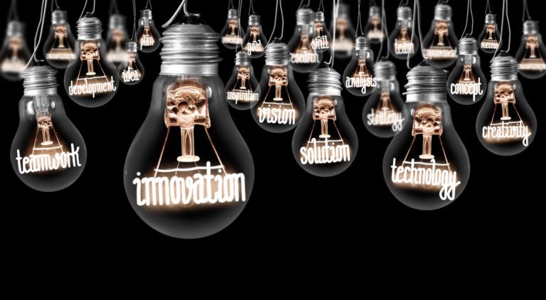 Lightbulbs with phrases inside, "innovation" "solution" "technology" etc.